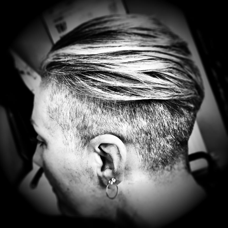 long on top aiwth short sides, slicked back